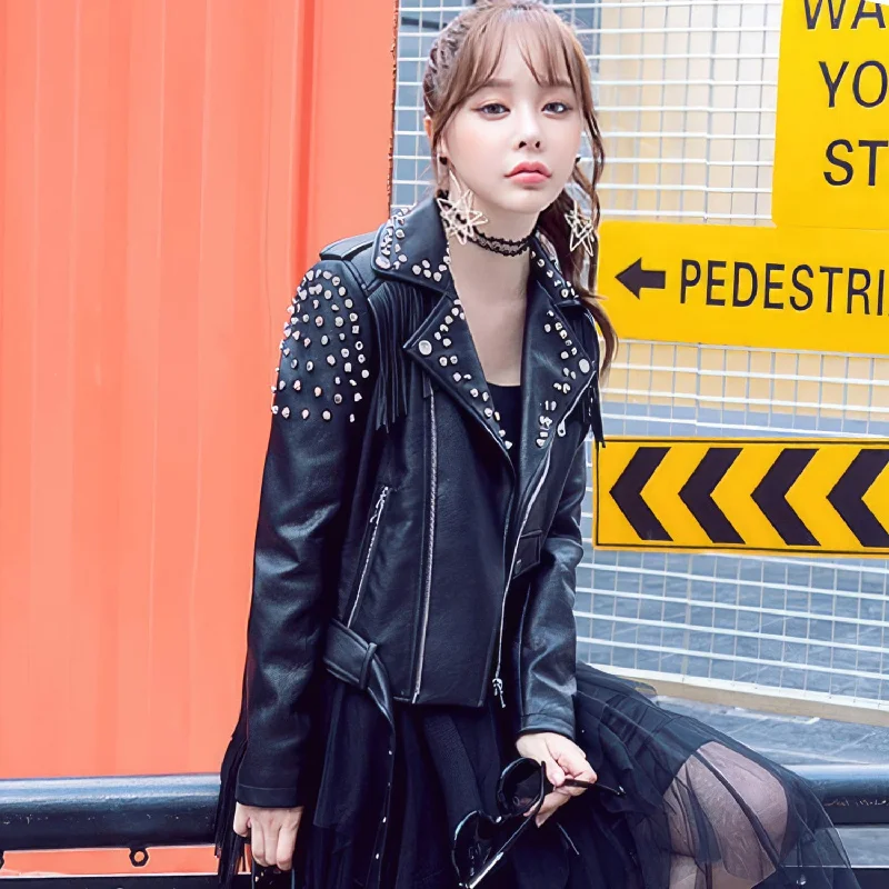 Classic Streetwear: Women's Black Biker Leather Jacket with Genuine Sheepskin, Tassels, Beaded Details, and Asymmetric Fringe Snapped Jacket Toggled Jacket Drawstring Jacket Classic Streetwear: Women's Black Biker Leather Jacket with Genuine Sheepskin, Tassels, Beaded Details, and Asymmetric Fringe Snapped Jacket Toggled Jacket Drawstring Jacket