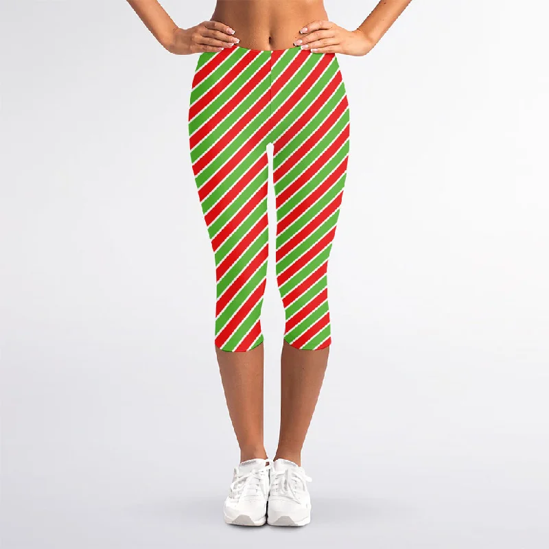 Xmas Candy Cane Stripes Print Women's Capri Leggings Fashionable Plus-Size Activewear Xmas Candy Cane Stripes Print Women's Capri Leggings Fashionable Plus-Size Activewear